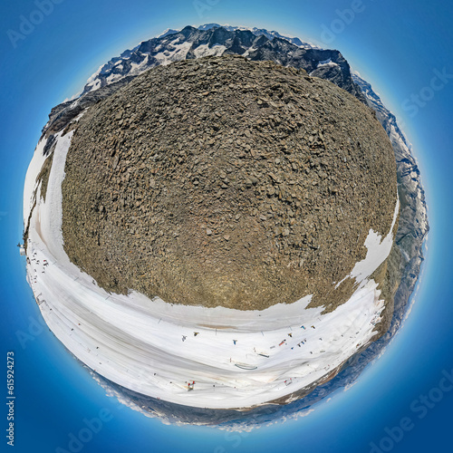 Aerial view of Glaciers melting due to climate change - Global warming and changing weather in the Alps photo