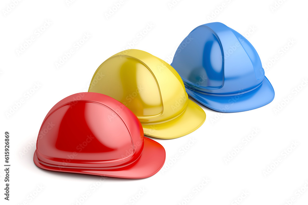 Fototapeta premium Three safety helmets with different colors on white background