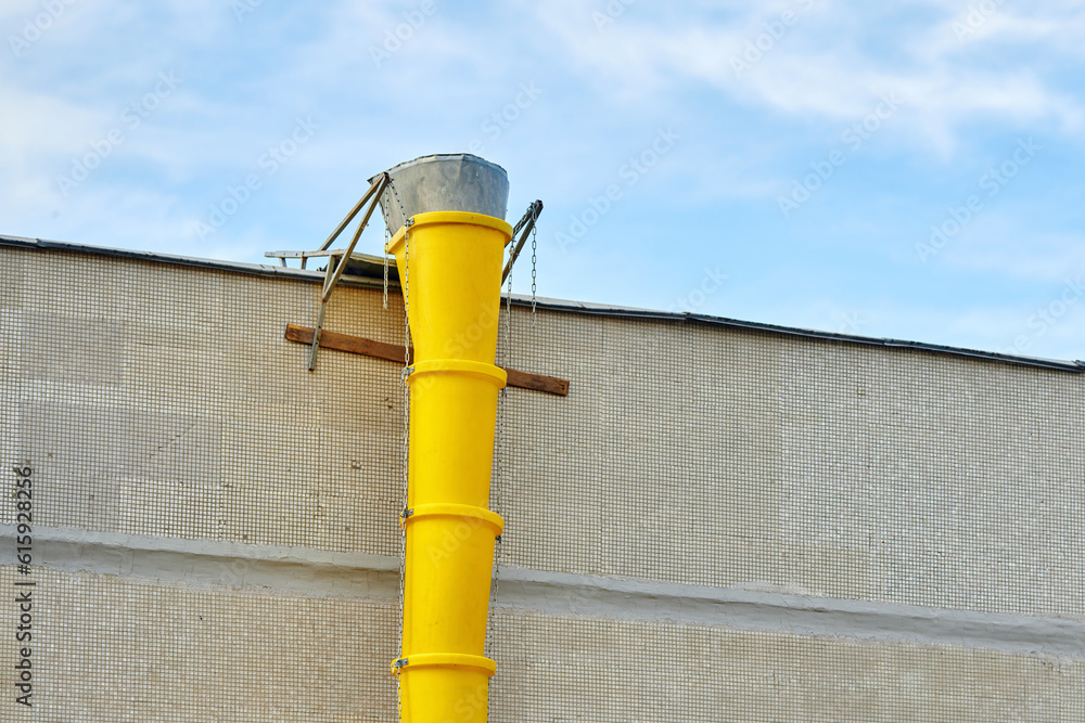 Debris chute, removing debris and waste from roof of the building