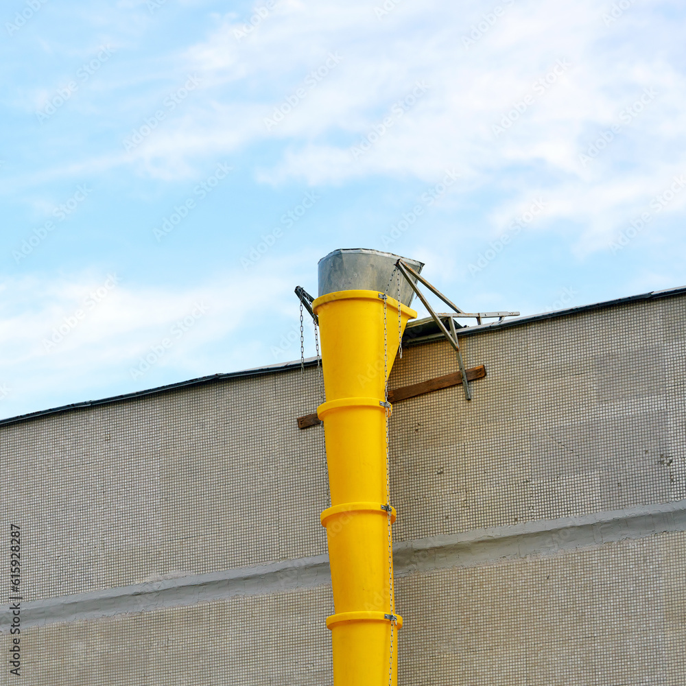 Debris chute, removing debris and waste from roof of the building