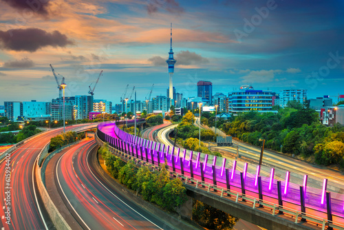 Cityscape image of Auckland skyline, New Zealand at sunset.