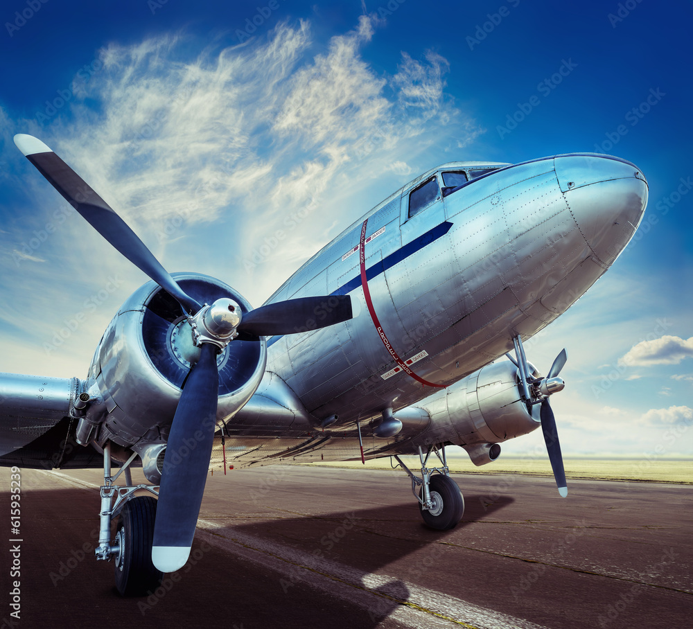 Fototapeta premium historical aircraft on a runway is waiting for take off