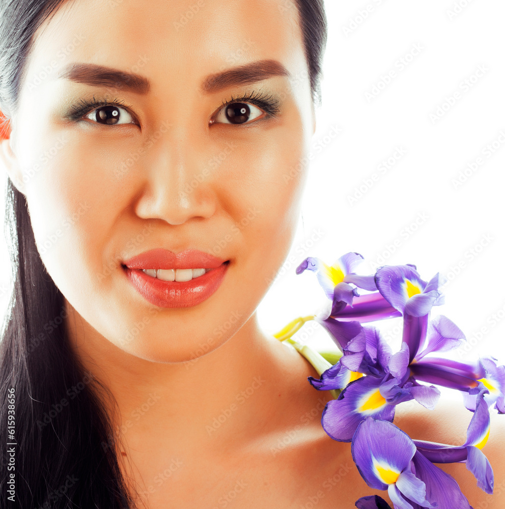 young pretty asian woman with flower purple orchid close up isolated spa, womans day concept young pretty asian woman with flower purple orchid close up isolated spa, womans day concept