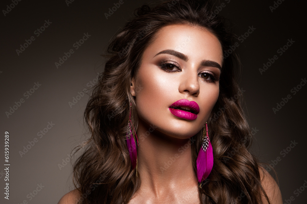Beauty Woman face Portrait. Beautiful model Girl with Perfect Fresh Clean Skin color lips pink. Brunette long hair. Isolated on beige background Beauty Woman face Portrait. Beautiful model Girl with Perfect Fresh Clean Skin color lips pink. Brunette long hair. Isolated on beige background