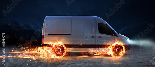 Super fast delivery of package service . van with wheels on fire on the road