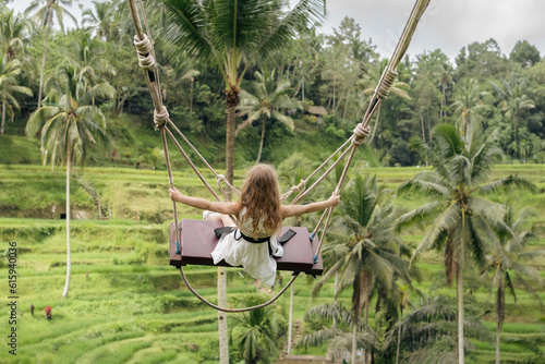 Bali swinging over Terrace rice fields, Ubud, Bali, Indonesia. 