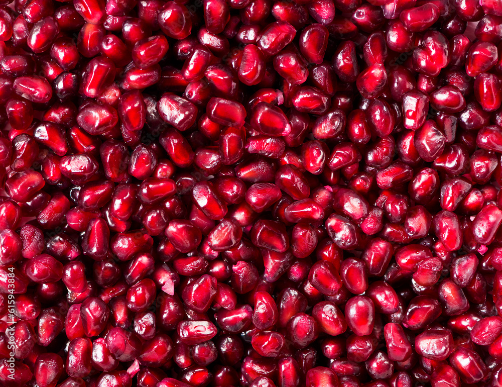 Close up of pomegranate seeds. Background, top view Close up of pomegranate seeds. Background, top view