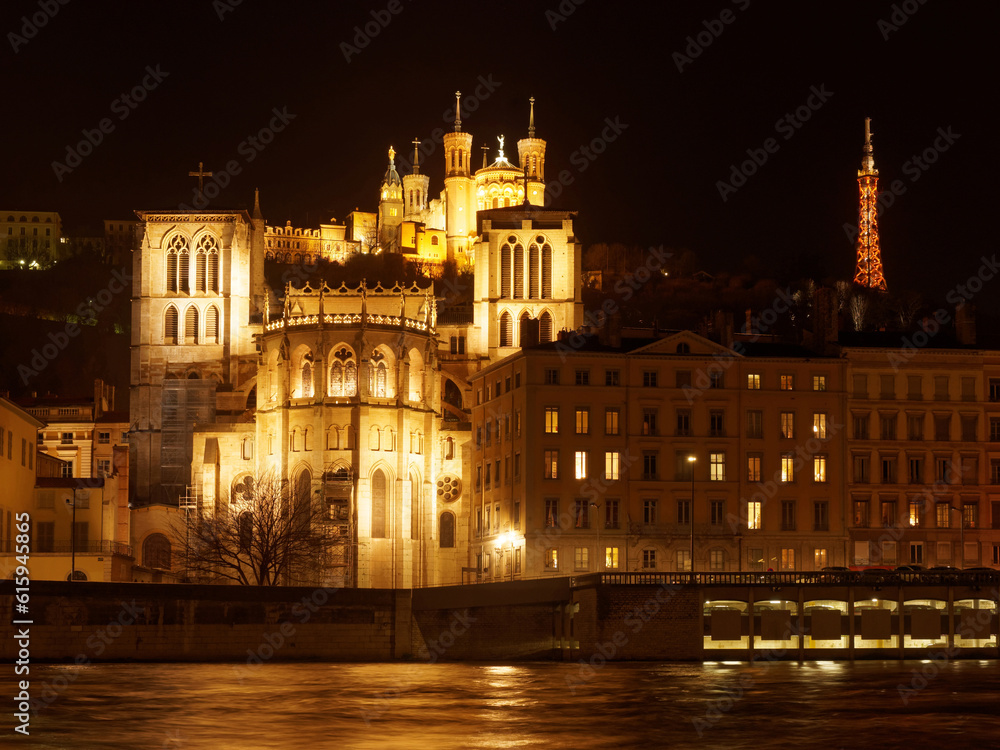 Notre Dame de Fourviere basilica and St. Jean cathedral at night , Lyon, France.
