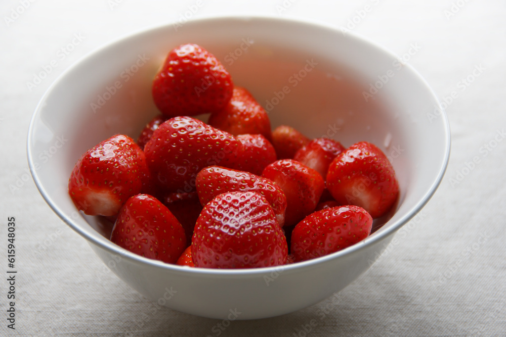 first strawberry harvested in his garden. selective focus . first strawberry harvested in his garden. selective focus .