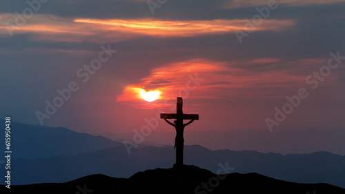 Holy Cross with sun at sunset