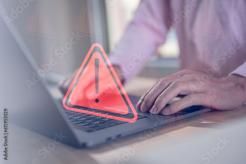 internet network security concept, man typing on computer keyboard with triangle warning sign developer with triangle caution warning sign notification error, maintenance, e-document data protection