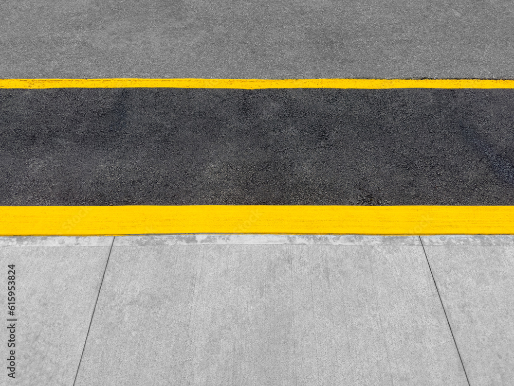 Fototapeta premium Full frame photo of sidewalk and asphalt texture
