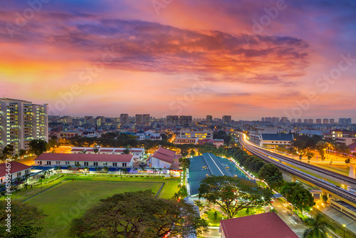 Photography Sunrise over Eunos residential neighborhood by MRT commuter train station in Sin