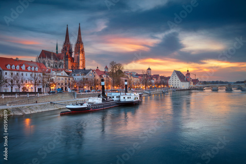Cityscape image of Regensburg, Germany during spring sunset.