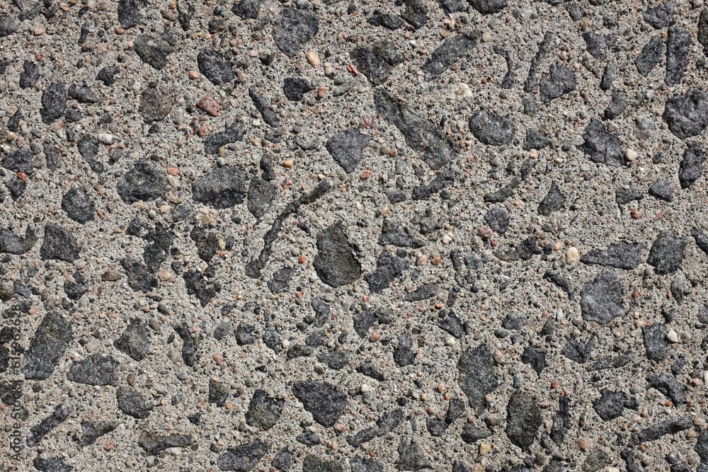 Exposed aggregate concrete paving, with small stones and grit as ...