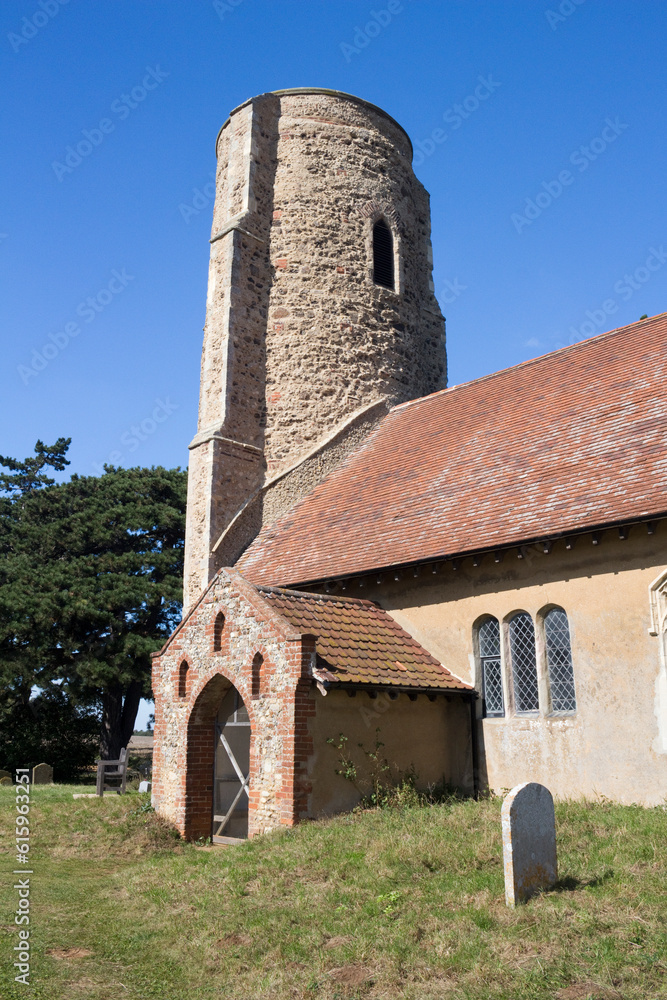 All Saints Church, Ramsholt, Suffolk, England, against a blue sky
