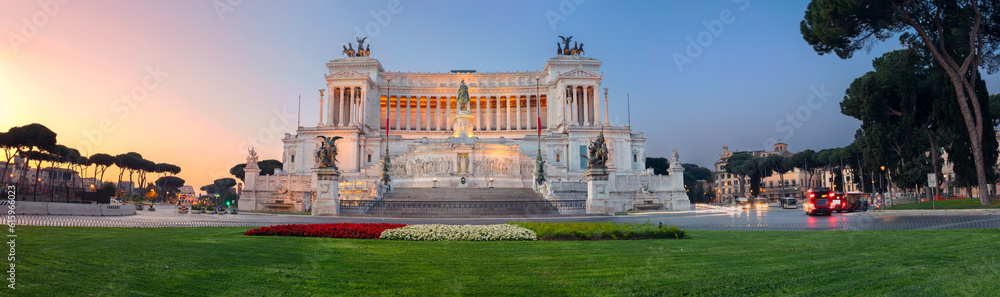 Panoramic image of the Monument of Victor Emmanuel II, Venezia Square, in Rome, Italy during sunrise.