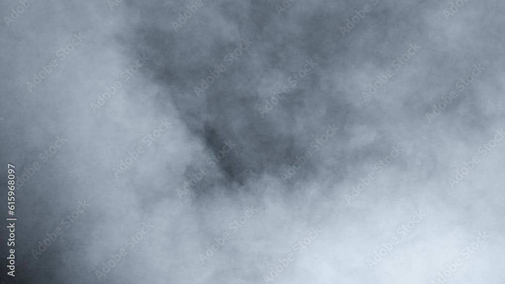 Smoke. Cloud of cold fog in blue light spot on black background. Abstract white smoke in slow motion. Light, white, fog, cloud, abstract, smoke, black, background, 4k, ice smoke cloud. Floating fog. Smoke. Cloud of cold fog in blue light spot on black background. Abstract white smoke in slow motion. Light, white, fog, cloud, abstract, smoke, black, background, 4k, ice smoke cloud. Floating fog.
