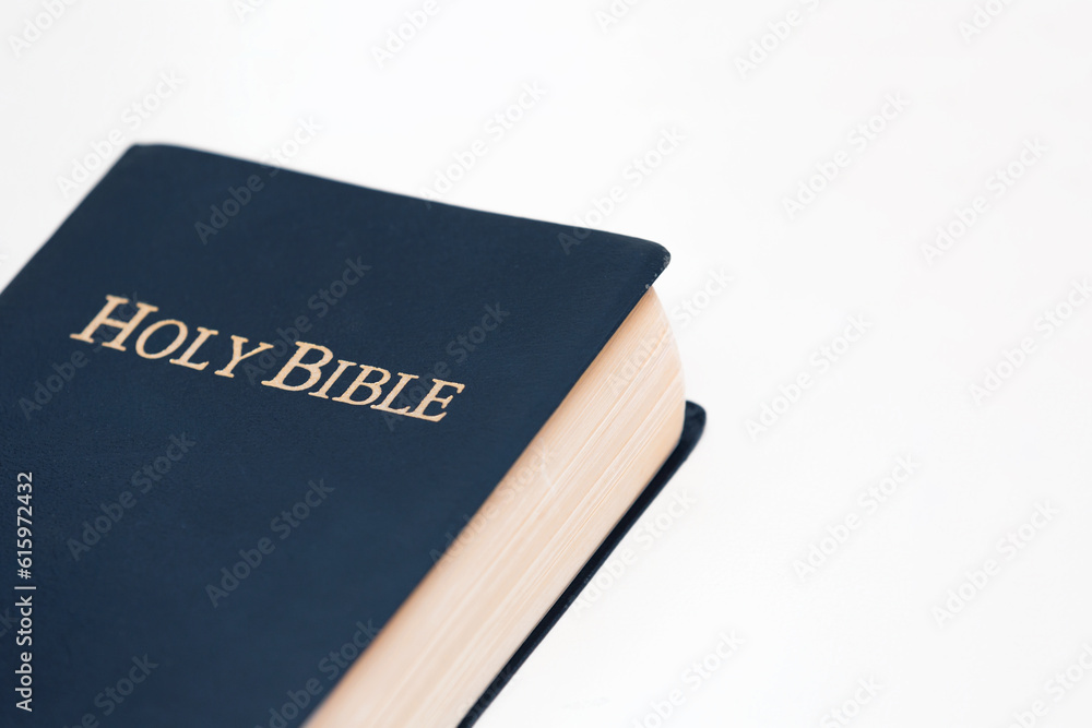 Top View of Holy Bible on White Platform Top View of Holy Bible on White Platform