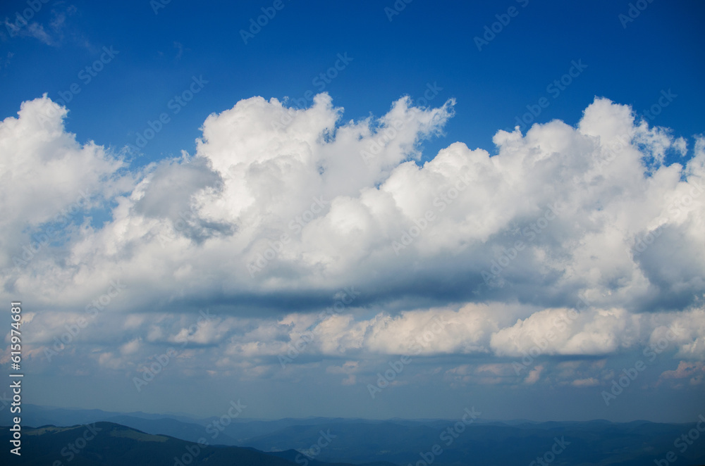 furry clouds on a blue sky on a beautiful summer weather furry clouds on a blue sky on a beautiful summer weather