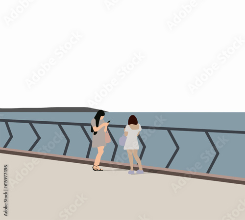 Female friends using smart phone on urban footbridge over river. Enjoying a break together outdoors. Lifestyle sunny best friend girls happy vacations.