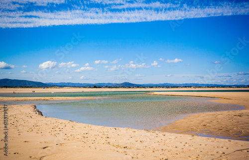 Paradise beach located in armona island inside ria formosa nature reserve in south portugal photo