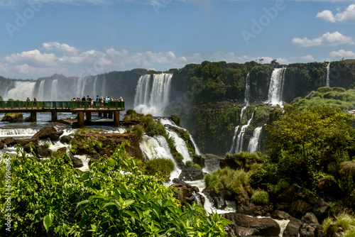 Tourists on a viewing platform at Igua   u National Park on Brazil Argentina Border