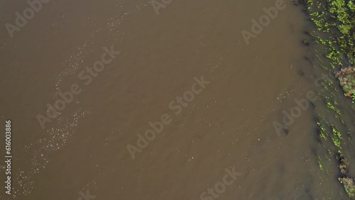 Aerial drone Thailand-Burma Railway Train Maeklong Death Railway bridge over the River Kwai JEATH on mountain pass photo