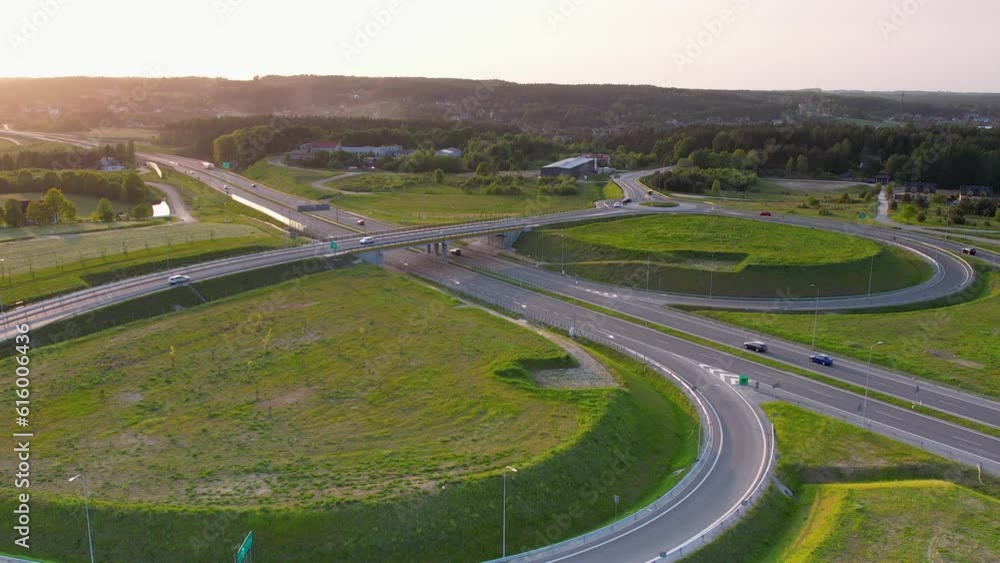 Aerial View Of Highway Road S6 In Kielno Gdynia, Poland During Golden Hour Sunset. Dolly Back Aerial View Of Highway Road S6 In Kielno Gdynia, Poland During Golden Hour Sunset. Dolly Back