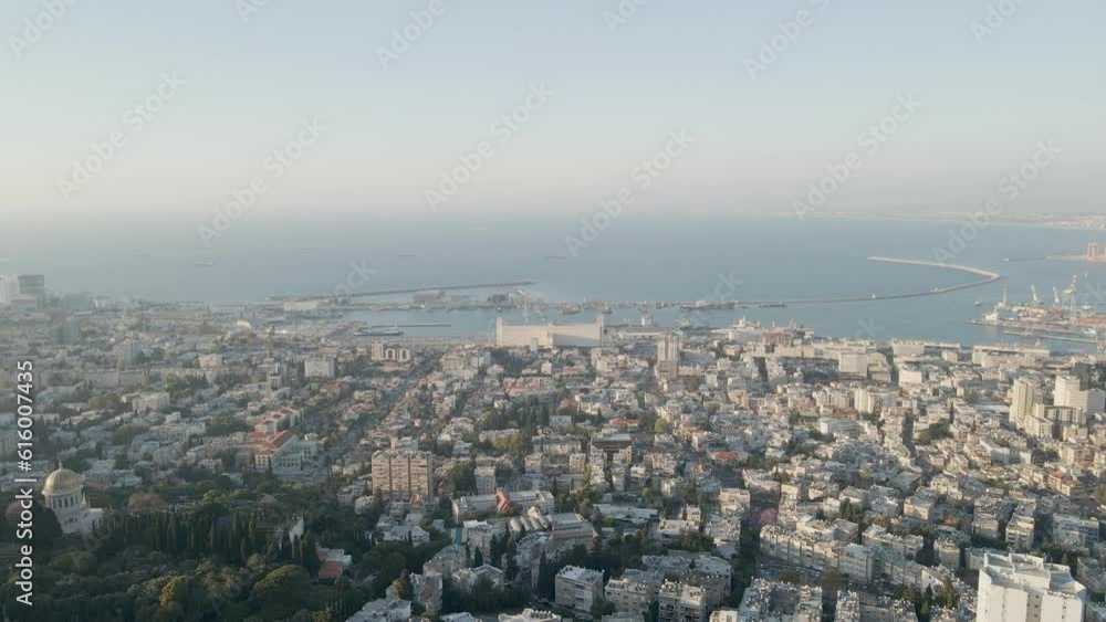 Amazing view of bahai gardens and surrounding cityscape. Mediterranean in background Amazing view of bahai gardens and surrounding cityscape. Mediterranean in background