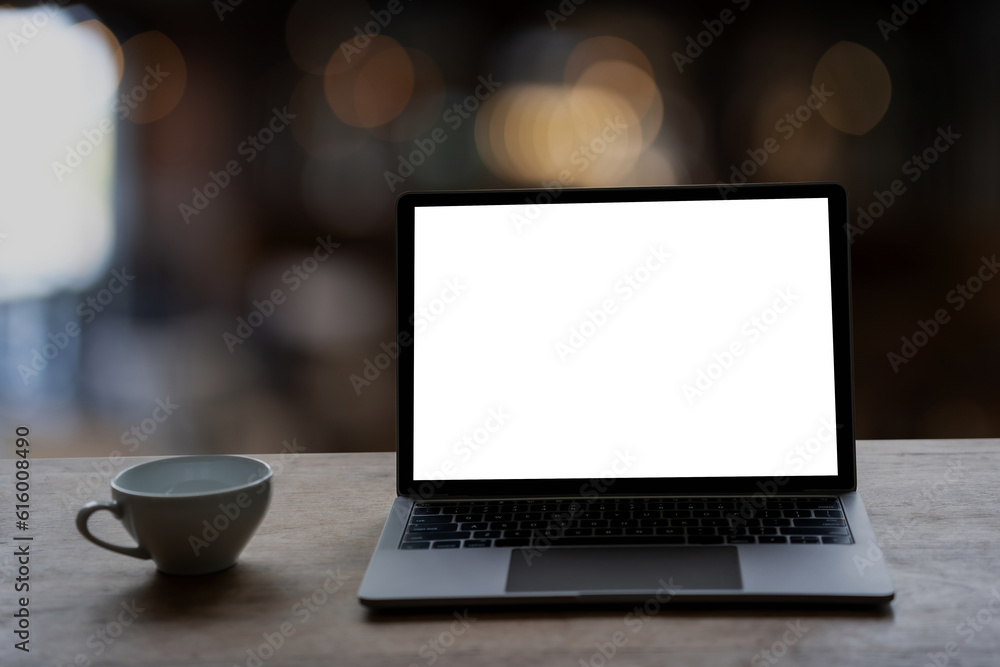 Fototapeta premium Laptop with blank screen on table. Workspace background new project on laptop computer with blank copy space screen for your advertising text message