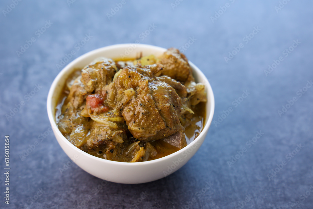 A traditional duck curry roast. Kerala style duck or chicken curry with