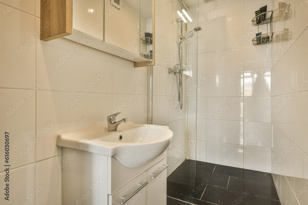 a small bathroom with a sink and mirror above the sink is not in use, but it's very clean a small bathroom with a sink and mirror above the sink is not in use, but it's very clean