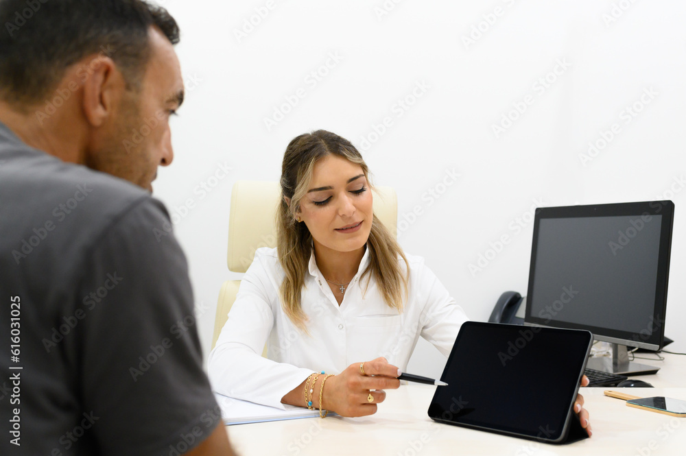 Focused woman showing tablet screen and explaining Focused woman showing tablet screen and explaining