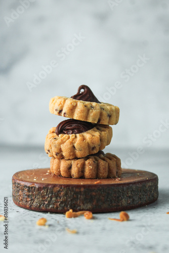 nutella cookies with choco on topping. traditional cake in Indonesia. served in grey and texture background