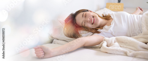 women so happy sweet dream on a new day, a Young beautiful Asian girl stretching her arms in the fresh early morning