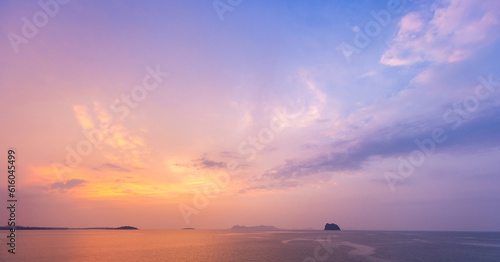 Sunset sky with sea and island background