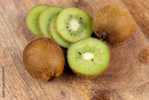 fresh green kiwi while cooking food in the kitchen