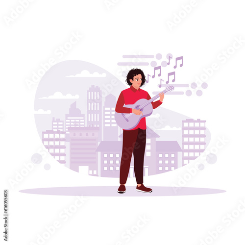 Street musician playing acoustic guitar with his fingers in the middle of the city. Trend Modern vector flat illustration.