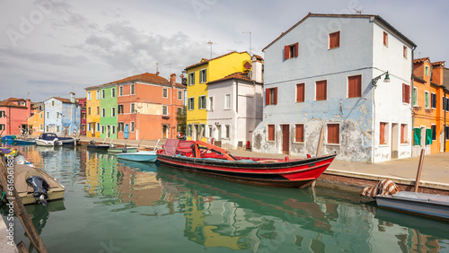 The Burano island near Venice  a canal with colorful houses  Italy  Europe.