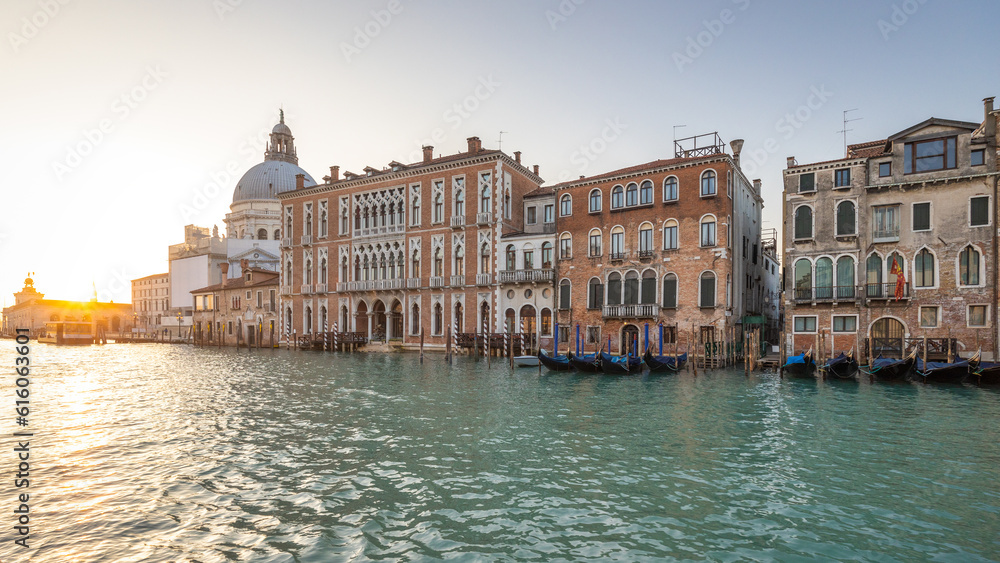The Grand Canal in Venice with the Santa Maria della Salute basilica at a beautiful sunrise, Italy, Europe.