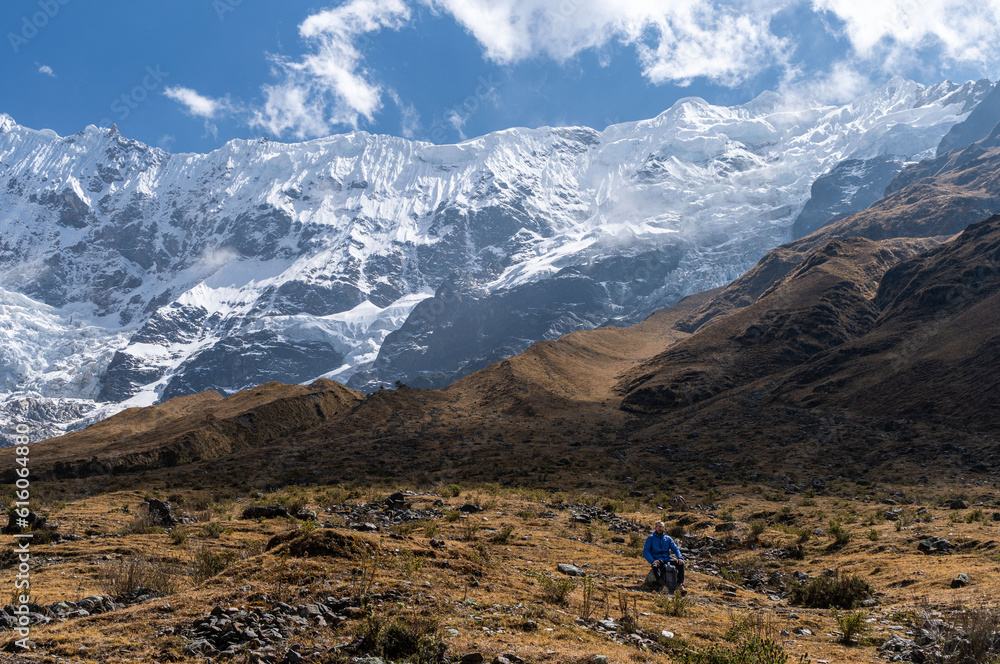 Hiker man traveler in Salcantay mountains in Cusco. Trekking concept