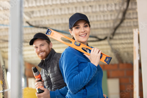 female builder smiling on the construction site