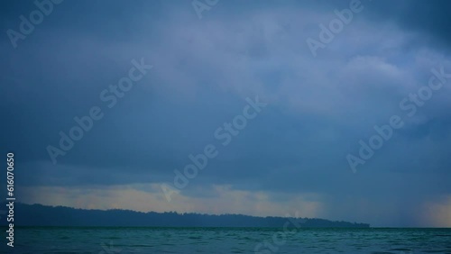 Time lapse of rain at sea. Showers move across the sea drenching everyone who meets on the way