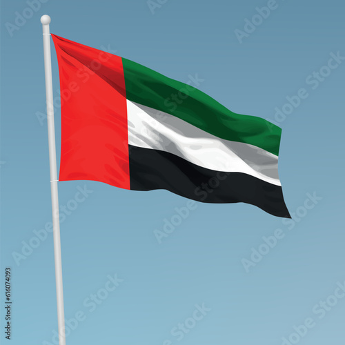 Waving flag of United Arab Emirates on flagpole. Template for independence day