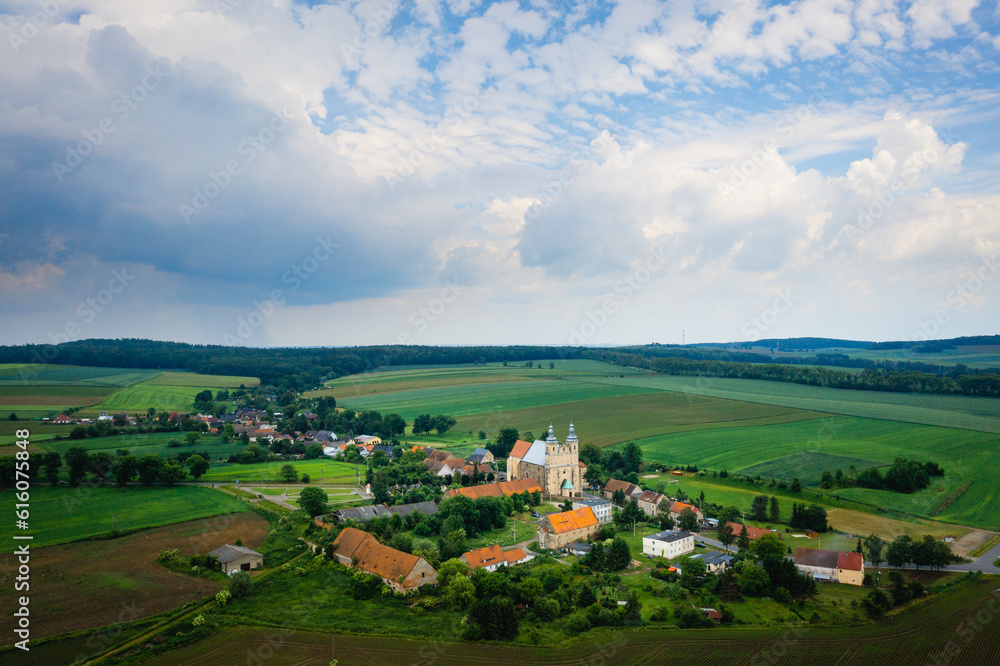 Bobolice, aerial view of polish village and sanctuary of Lady of Bobolica, Lower Silesian landscape. Drone view of beautiful, countryside landscape with church.