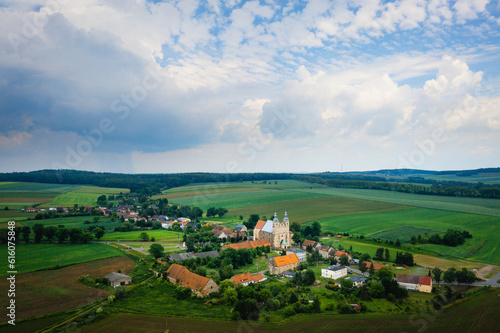 Bobolice  aerial view of polish village and sanctuary of Lady of Bobolica  Lower Silesian landscape. Drone view of beautiful  countryside landscape with church.