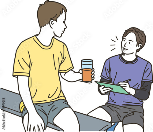 ジムのインストラクターの男性と男性会員
