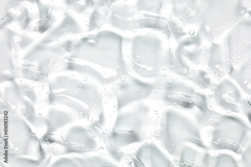 Serum texture, clear liquid gel with bubbles, cosmetic background