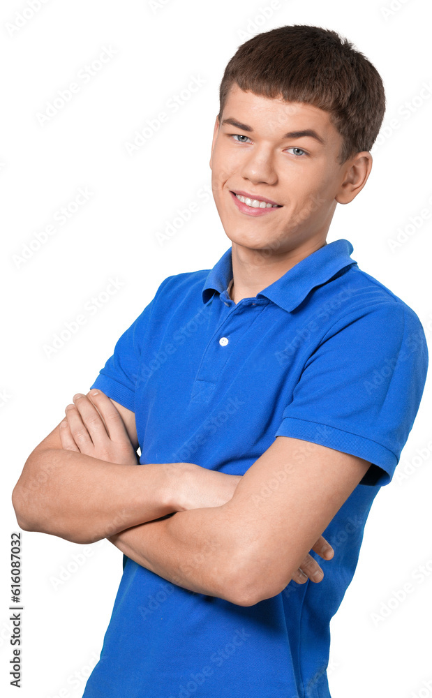 Casually dressed teenager with his arms folded in front of him Casually dressed teenager with his arms folded in front of him